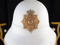 Lot 109 - Royal Marines bandsman's tunic and a pith helmet.