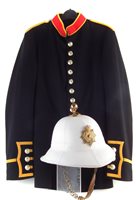 Lot 110 - Royal Marines bandsman's tunic and a pith helmet.