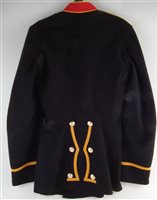 Lot 110 - Royal Marines bandsman's tunic and a pith helmet.