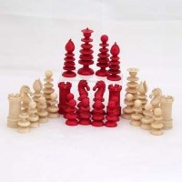 Lot 13 - Ivory red and white chess set, 19th century