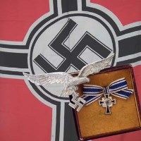 Lot 32 - WW2 Nazi flag, badge and medal.