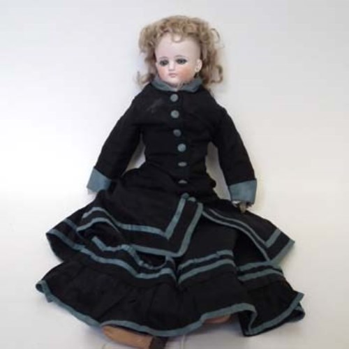 Lot 62 - Mid 19th century French dome head doll with