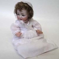 Lot 72 - S and M flirty eye baby doll.