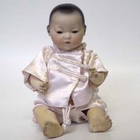 Lot 75 - AM oriental doll model 353.