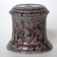 Lot 143 - Ruskin high fired vase stand   decorated with a