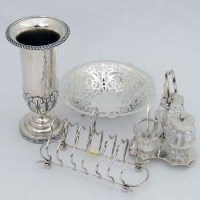 Lot 195 - Group of silver: bon bon dish; toast rack; vase