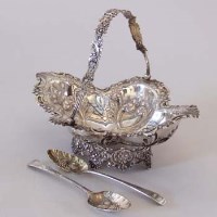 Lot 198 - Silver basket with swing handle and a pair of