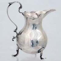 Lot 201 - Mid 18th Century silver jug.
