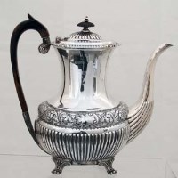Lot 208 - Embossed silver coffee pot.