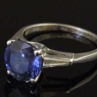Lot 256 - Single stone sapphire ring, round mixed cut