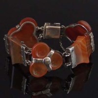 Lot 264 - Celtic style silver and agate bracelet composed