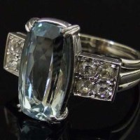Lot 279 - Aquamarine and diamond ring, the cross shaped