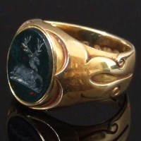 Lot 307 - 18ct gold bloodstone seal ring.