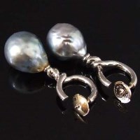 Lot 332 - Natural black South Seas pearl earrings in 18ct