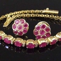 Lot 339 - 18ct gold bracelet set with twelve rubies