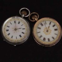 Lot 351 - 14k gold fob watch and a silver fob watch (2).