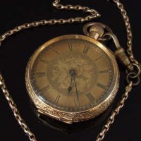Lot 353 - 18k gold cased open faced watch and 9ct chain.
