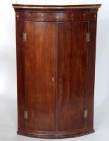 Lot 641 - Mahogany wall hanging bow fronted corner cupboard