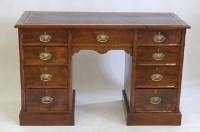 Lot 671 - Late Victorian kneehole desk