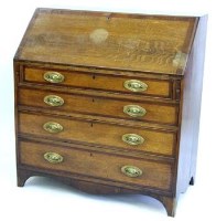 Lot 674 - Late Georgian oak bureau