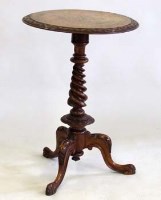 Lot 687 - Walnut tripod table.