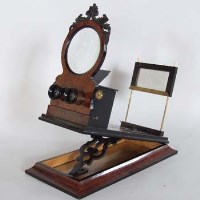 Lot 3 - 19th century amboyna and ebony stereoscope