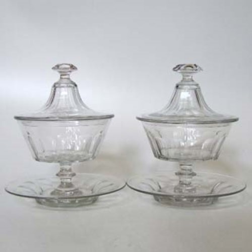 Lot 65 - Pair of glass lidded dishes and stands