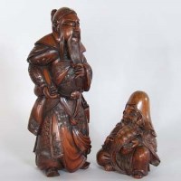 Lot 90 - Two carved Japanese figures.