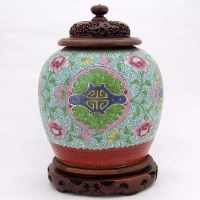 Lot 92 - Chinese vase with pierced wooden cover and stand.