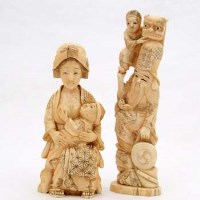 Lot 102 - Japanese ivory okimono of a mother and child