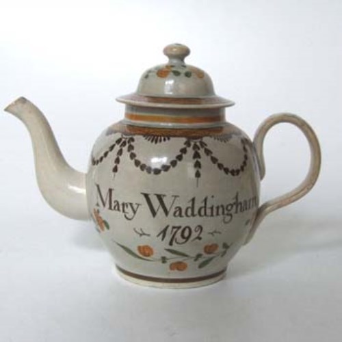 Lot 124 - Pearlware teapot named Mary Waddington.