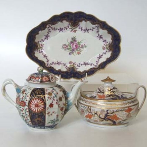 Lot 128 - Worcester lozenge shaped dish, a Teapot and a Newhall Sucrier
