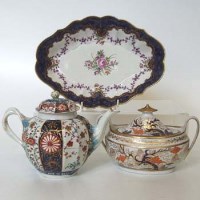 Lot 128 - Worcester lozenge shaped dish, a Teapot and a Newhall Sucrier