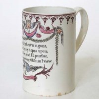 Lot 145 - Pearlware mug with religious verse