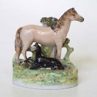 Lot 159 - Staffordshire horse group.