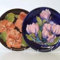 Lot 203 - Moorcroft Hibiscus plate and magnolia plate.