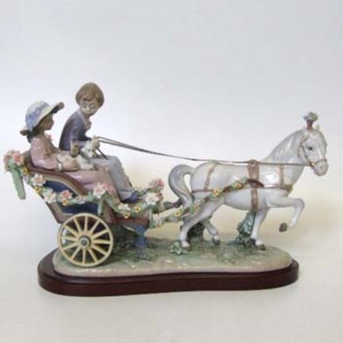 Lot 226 - Lladro figure group of pony and trap.