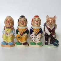 Lot 239 - Three Kevin Francis clowns and puss in boots.