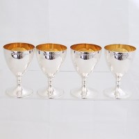 Lot 259 - Four silver small goblets
