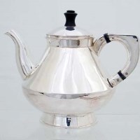 Lot 260 - Circular silver teapot