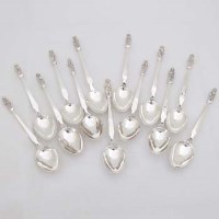 Lot 266 - Set of thirteen cast silver apostle spoons