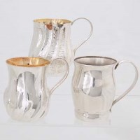 Lot 267 - Three silver christening mugs.