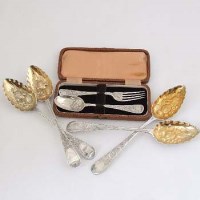 Lot 297 - Four silver berry spoons and a Christening set.