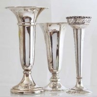 Lot 299 - Three silver specimen vases.