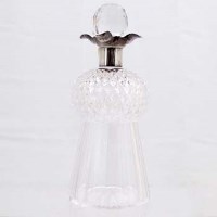 Lot 311 - Cut glass thistle shaped decanter with silver