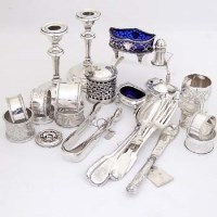 Lot 320 - Pair of silver candlesticks, various napkin rings, condiment set, spoons.
