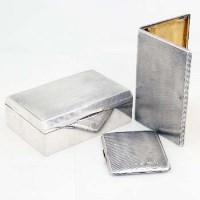Lot 330 - Silver cigarette box and two silver cigarette