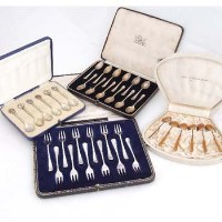 Lot 331 - Four cased sets of spoons and cake forks (4).