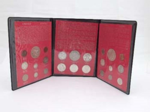 Lot 350 - Coin collection including 2 US silver Ellis Island and six credit Suisse silver ingots plus many commemorative coins cased sets and loose coins.