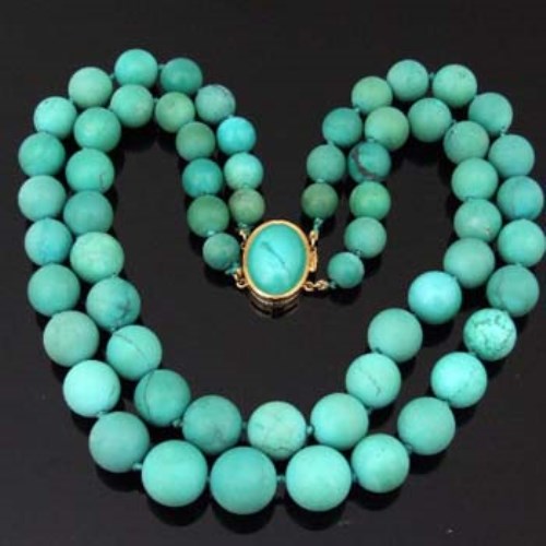 Lot 406 - Turquoise choker necklace of two strands of